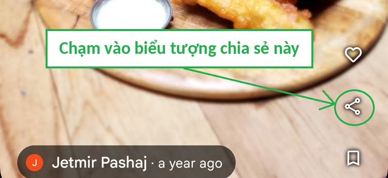 Với ảnh thường, chạm vào biểu tượng Chia sẻ nằm trên ảnh trong ứng dụng Google Maps